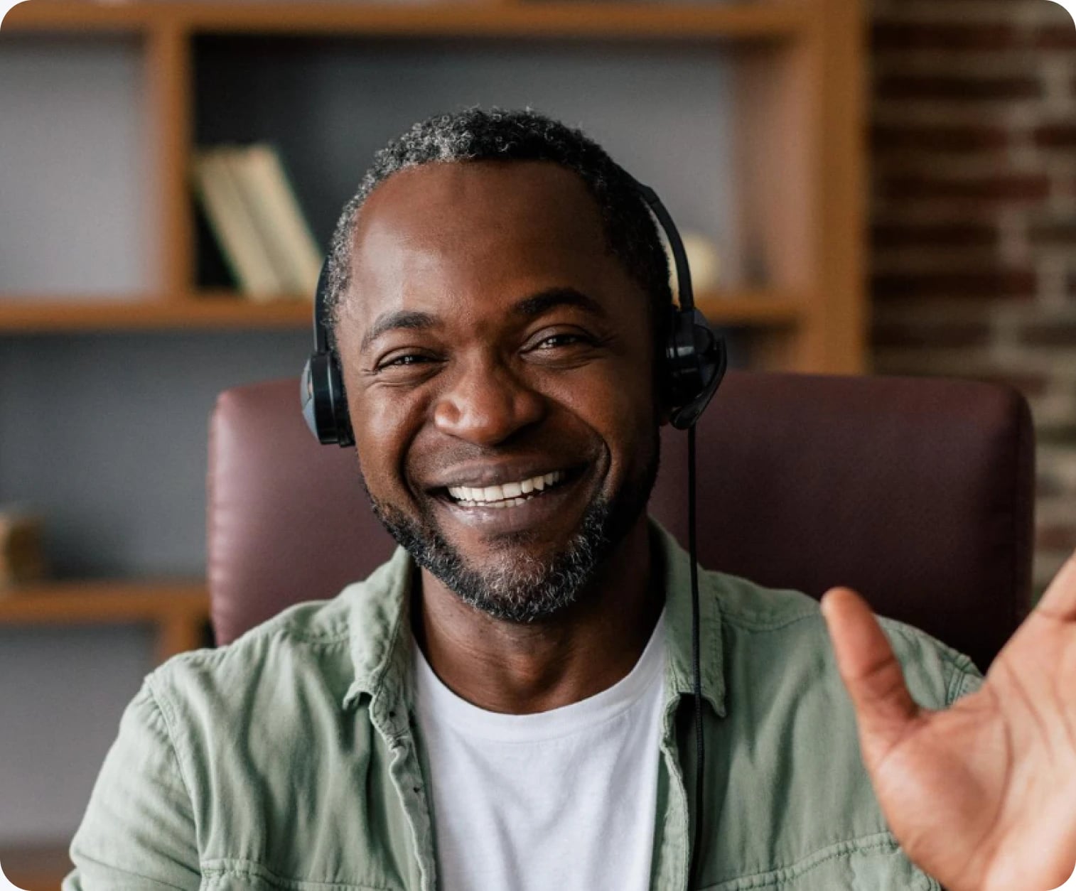 Customer success manager smiling and waving during a live training session
